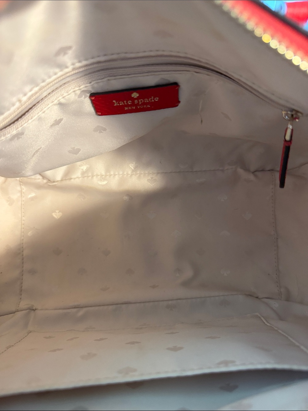 kate spade Cream Tote Interior with Red Logo Tag